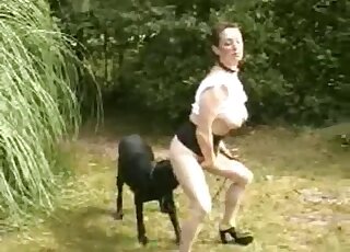 Cute black dog licks her wide-opened wet cunt